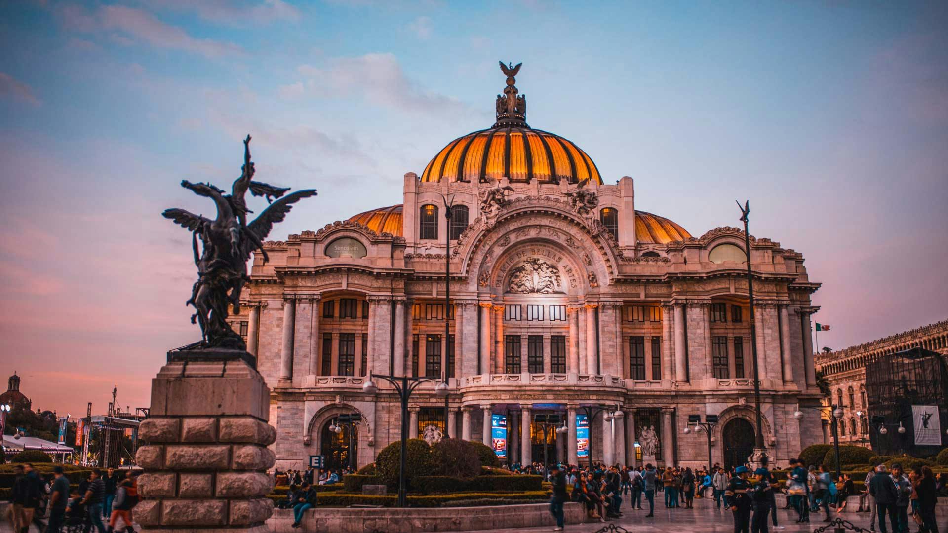 A Roman style looking building framed by columns and a cupola in Mexico City
